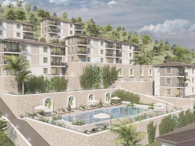 DİDİM AKBÜK’TE DENİZ MANZARALI KÖŞE BAŞI 2+1 BAHÇE KATI DAİRE