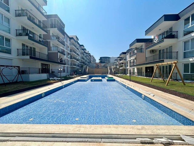AYDIN KUŞADASI KİRAZLI'DA DOĞA İÇİNDE HAVUZLU SATILIK 1+1 DAİRE