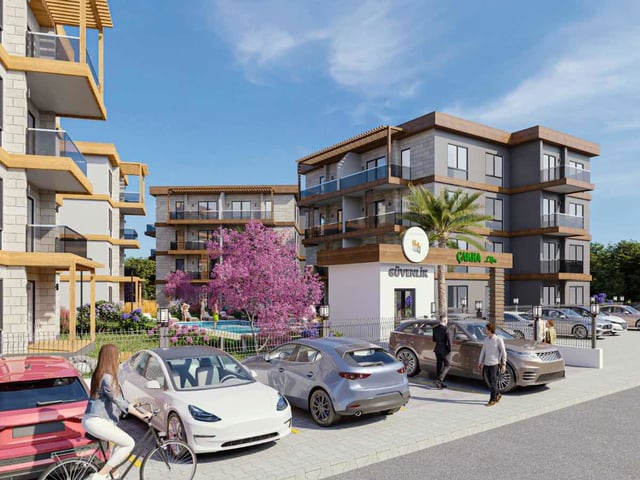 HAVUZLU, OTOPARKLI 4 BLOKLU SITEDE, PROJEDEN %50 PEŞINATLI DAIRE