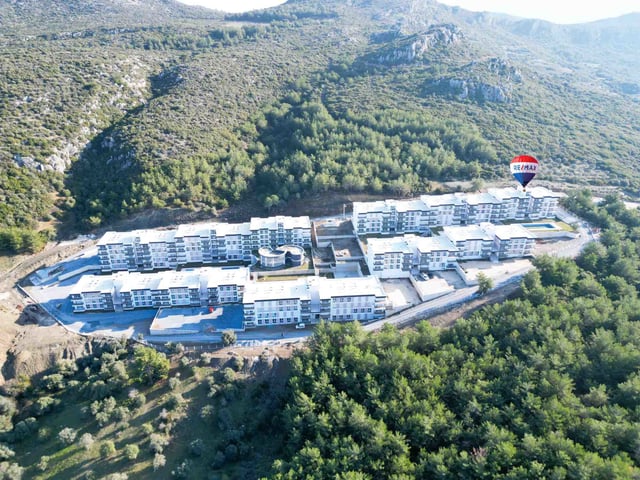 KUŞADASI EŞIN VADI SITESINDE SATILIK HAVUZLU 1+1 DAIRE