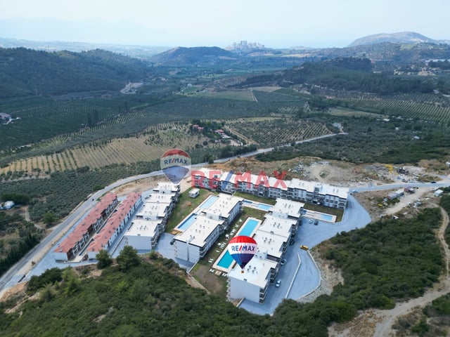 SATILIK KUŞADASI EŞİN VADİ SİTESİNDE BAHÇE KATI 1+1 DAİRE...
