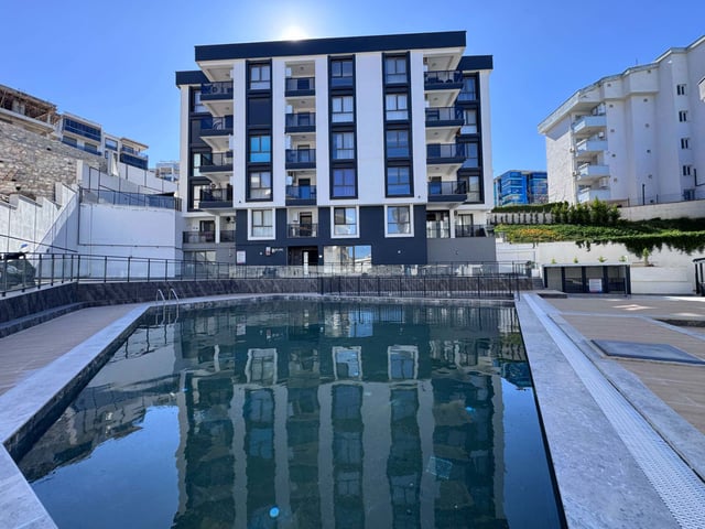 DEĞIRMENDERE BEMKA PARADISE SITESINDE HAVUZ CEPHELI, GÜVENLIKLI SITEDE KIRALIK 1+1 DAIRE