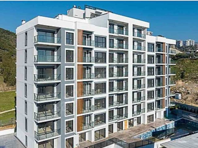 BAYRAKLI ONUR MH. HAVUZLU GÜVENLIKLI SITEDE 1+1 SATILIK