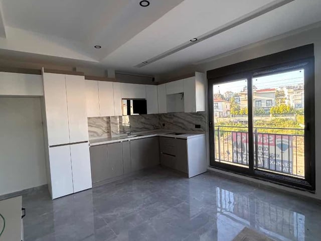 ILICA MAHALLESİNDE BULVAR ÜZERİNDE DÜKKAN ÜZERİ SATILIK 2+1 ASANSÖRLÜ DAİRE