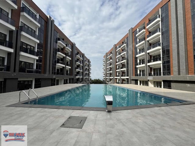 REMAX ŞEHİR ALKAŞ MEYDAN SUİTS FULL DENİZ MANZARALI SATILIK 1+1