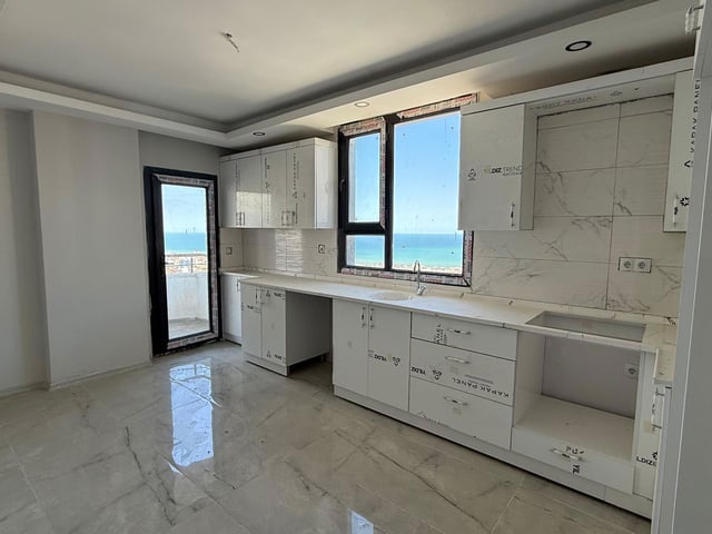 ALAÇAM CADDESİ'NE CEPHE DENİZ MANZARALI 4+1 SATILIK DAİRE