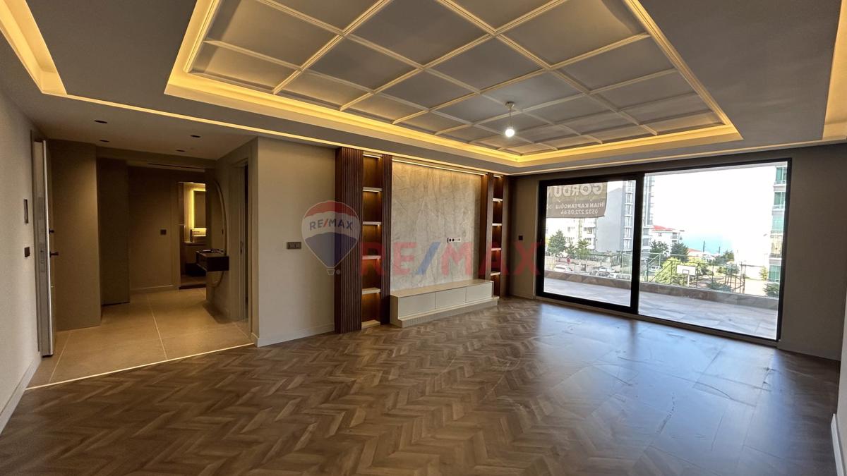 DOĞUMAK TOWER'DA ALANLI 'DA DENİZ MANZARALI 2+1 DAİRELER