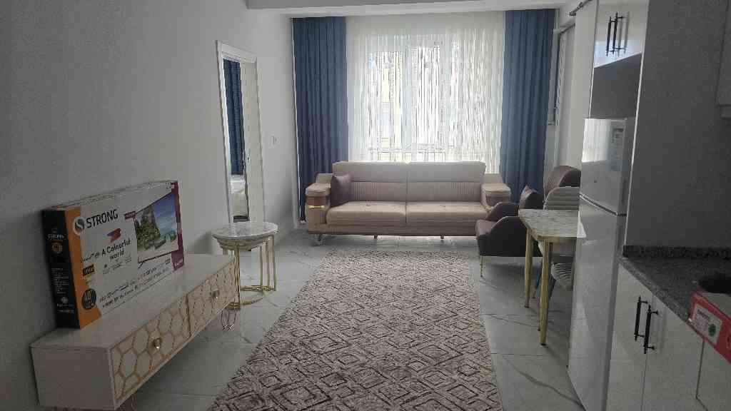 REMAX MODEL DEN AKKONAK MAHALLESINDE 1+1 SIFIR SATILIK APART