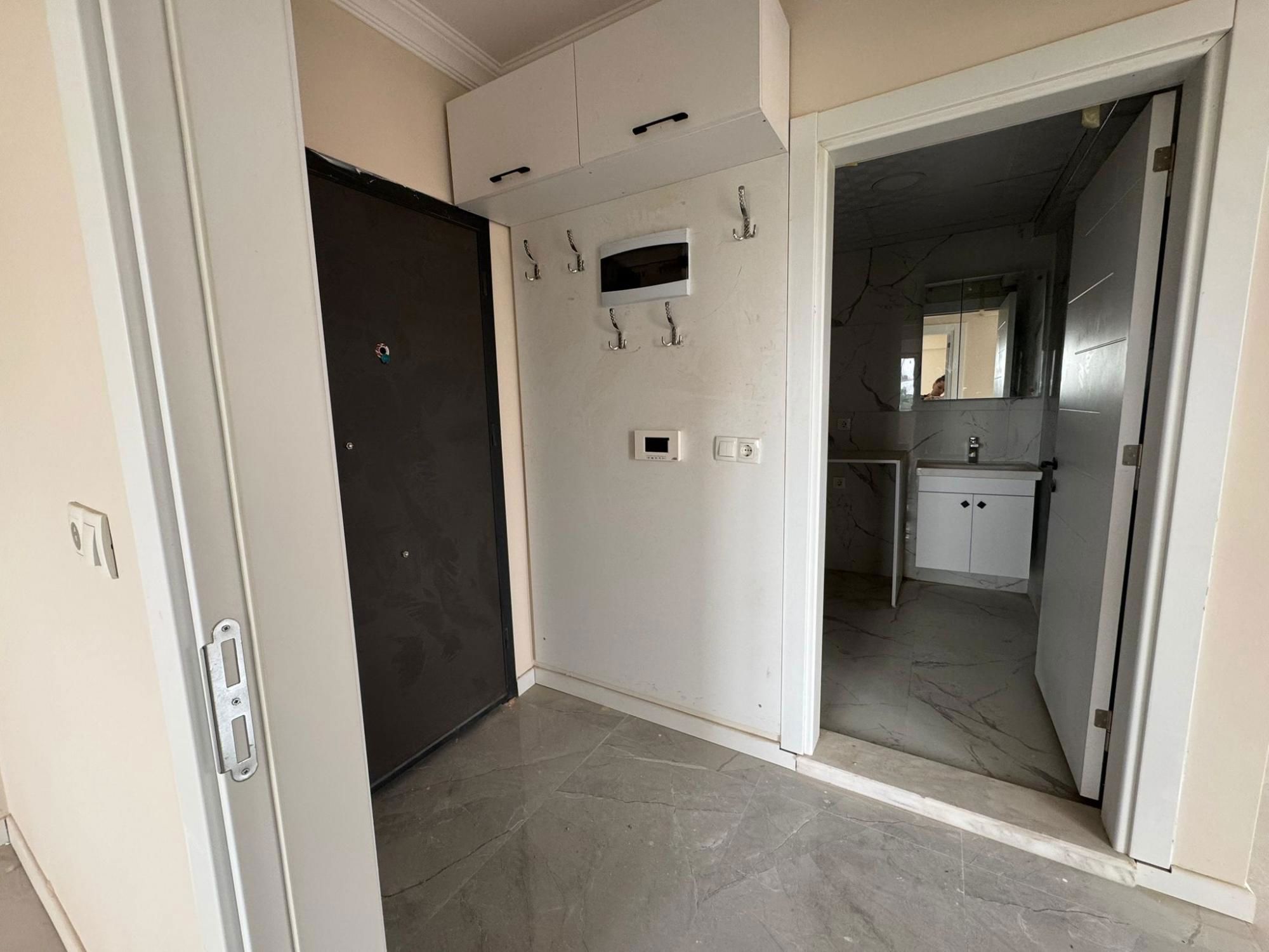 DOĞAYLA İÇ İÇE YAŞAM: YUNUSEMRE AKGEDIK’TE SIFIR BINADA SATILIK 1+1 DAIRE!