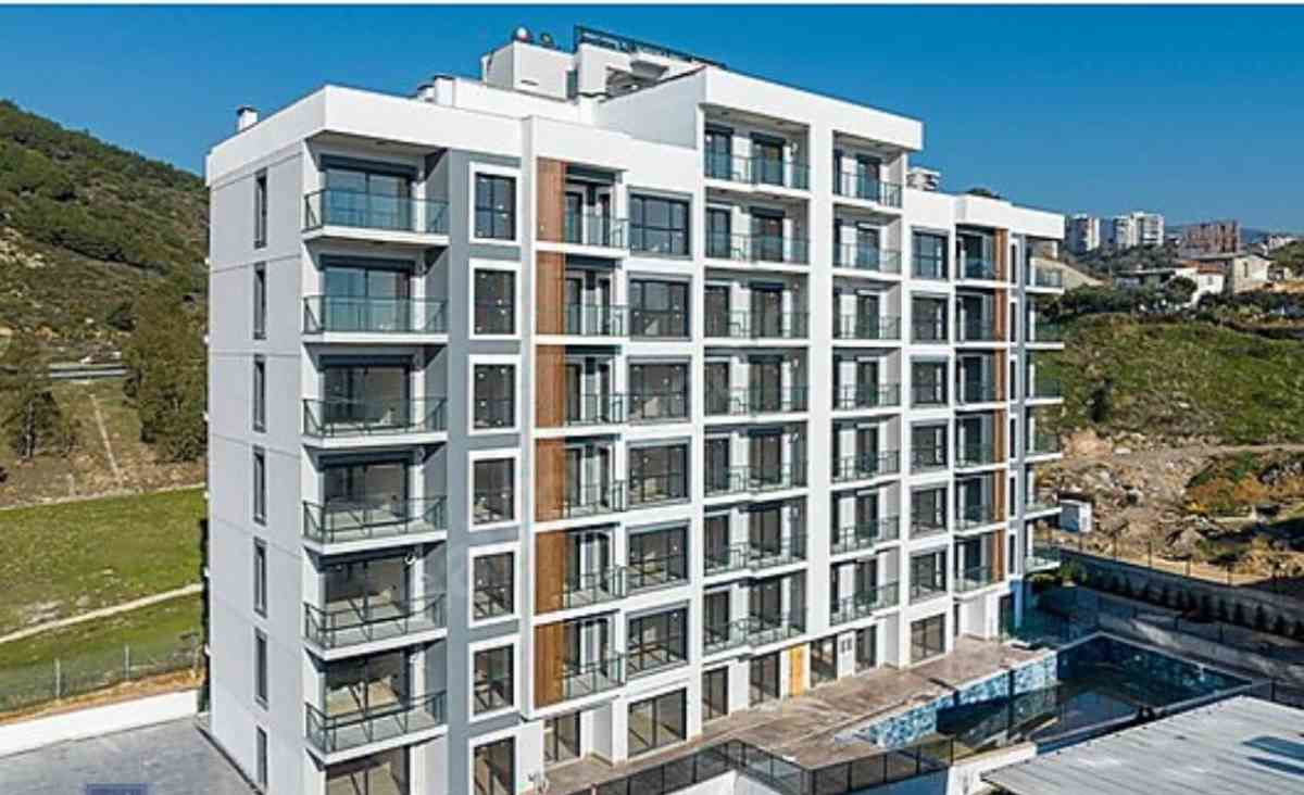 BAYRAKLI ONUR MH. HAVUZLU GÜVENLIKLI SITEDE 1+1 SATILIK