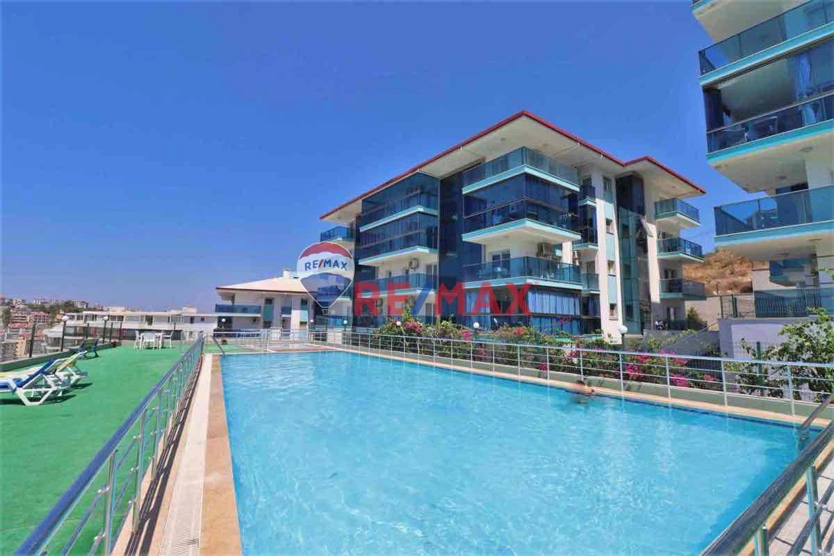 KUŞADASI DEĞIRMENDERE MH. TURKUAZ EVLER SITESINDE 2+1 ARAKAT DAIRE